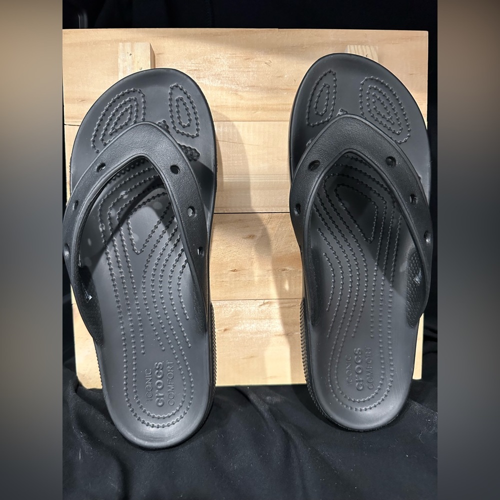 Black Croc flip flops only worn once.